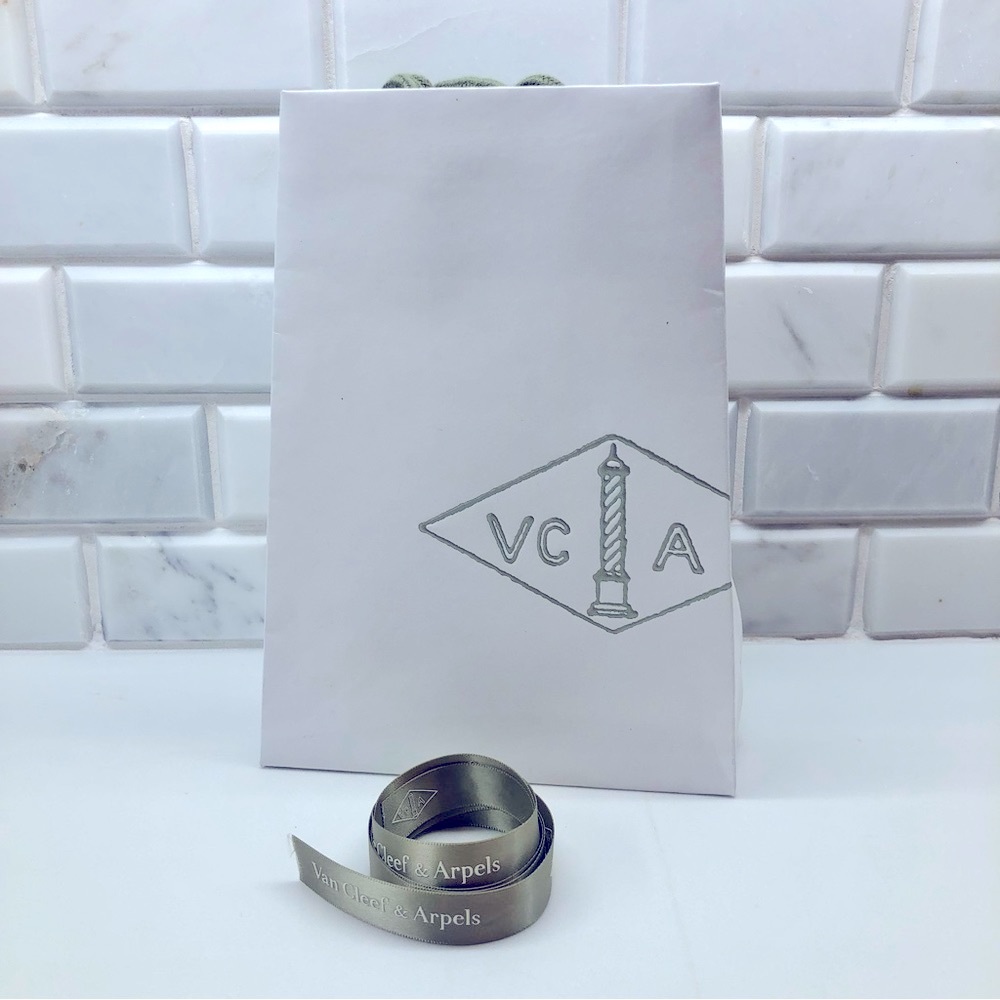 Authentic Small Van Cleef & Arpels gift bag, includes ribbon